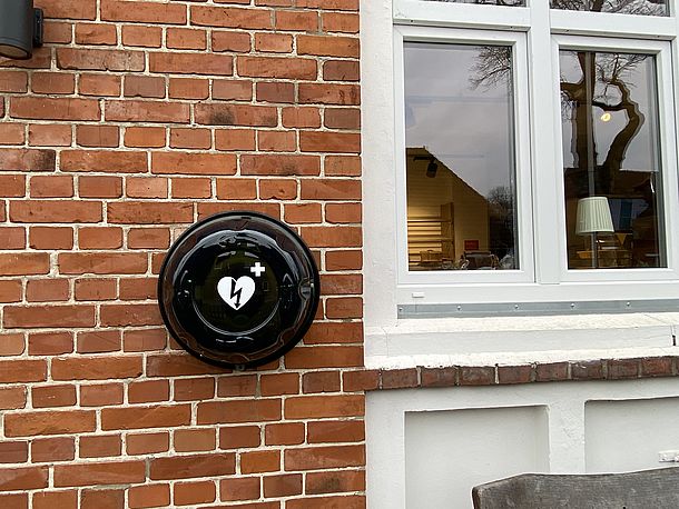 runder beleuchteter Wandkasten mit Entnahmealarm